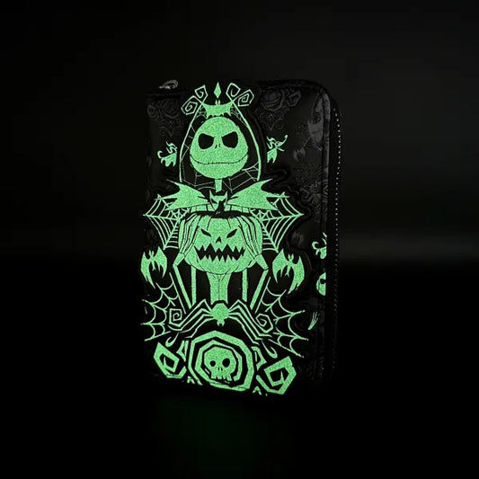 Glow in the dark view of Nightmare Before Christmas wallet on a black background