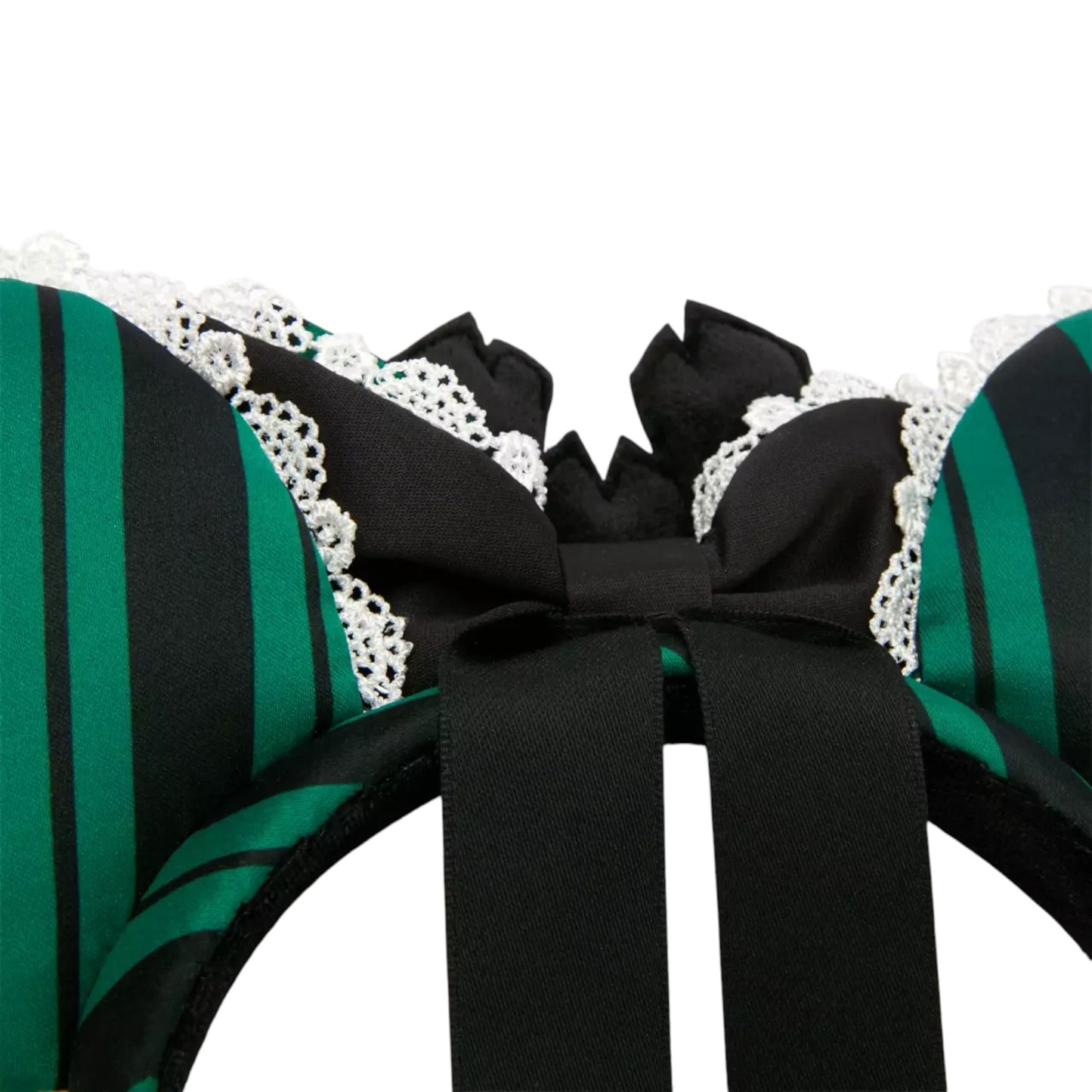 Close-up of a green and black striped The Haunted Mansion Ghost Host headband with a large black bow and white lace trim on a white background.