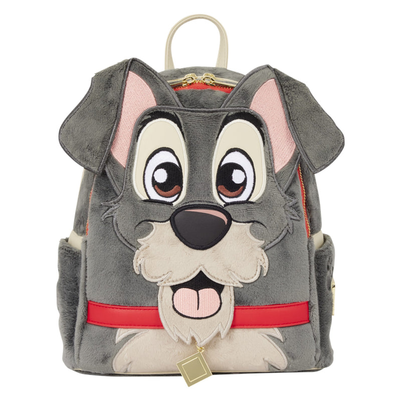 Plushy Tramp Mini Backpack featuring a gray dog design with pink inner ears, cream-colored snout and chin, large embroidered eyes, a red collar, and a small hanging gold tag, shown on a plain white background.