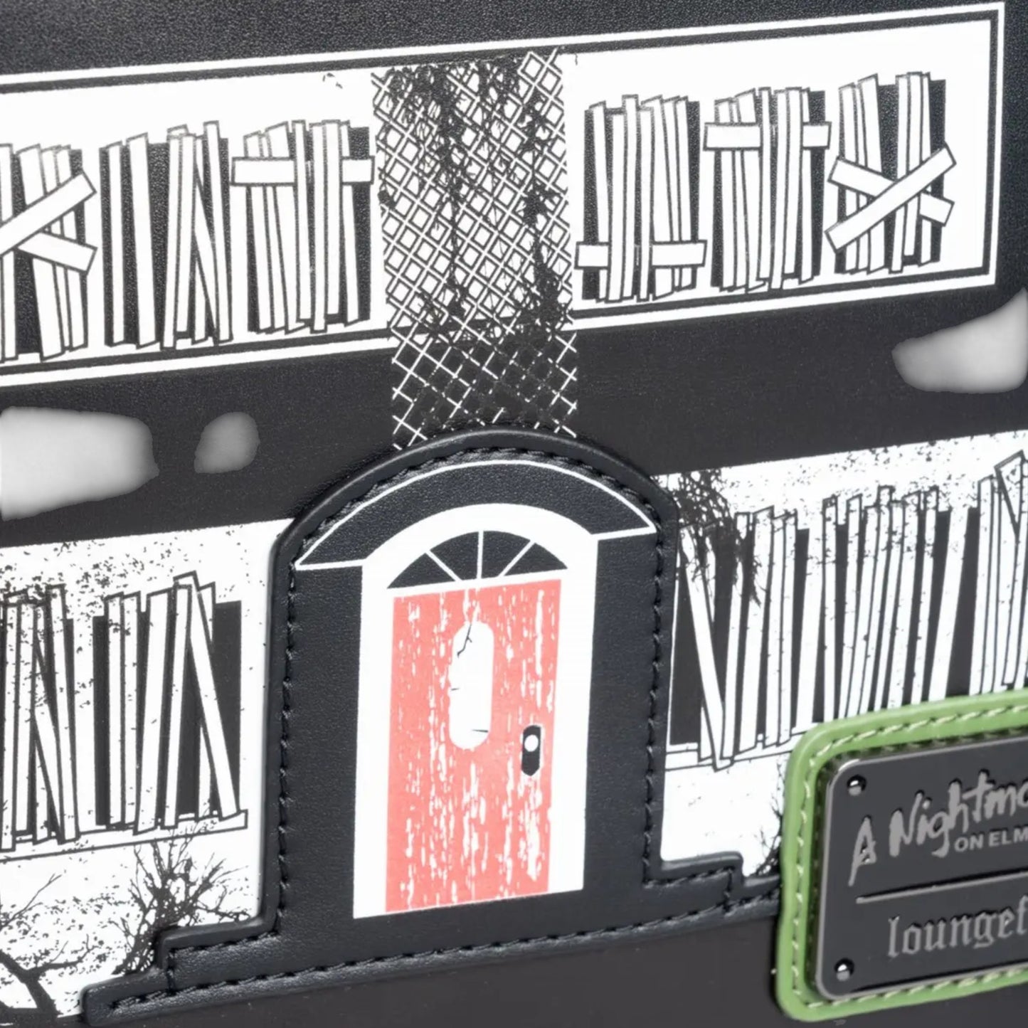 A Nightmare on Elm Street Freddy Mini Backpack with a front door illustration and 'A Nightmare on Elm Street' branding.