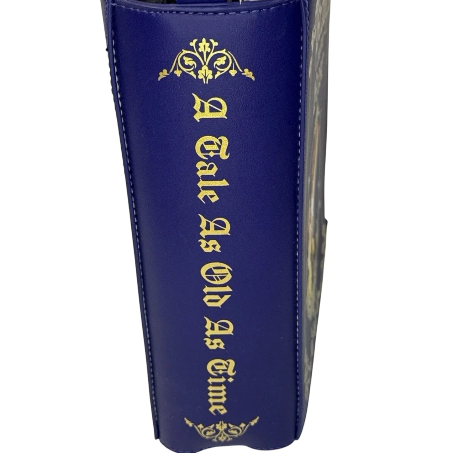 Blue Blue Beauty and the Beast Book Convertible backpack with gold text and design on a white background