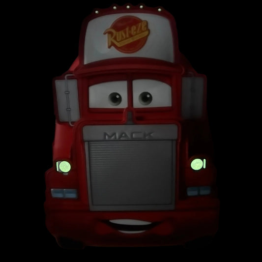 Glowing Red Mack truck with Mack face and Rust-eze logo on a black background