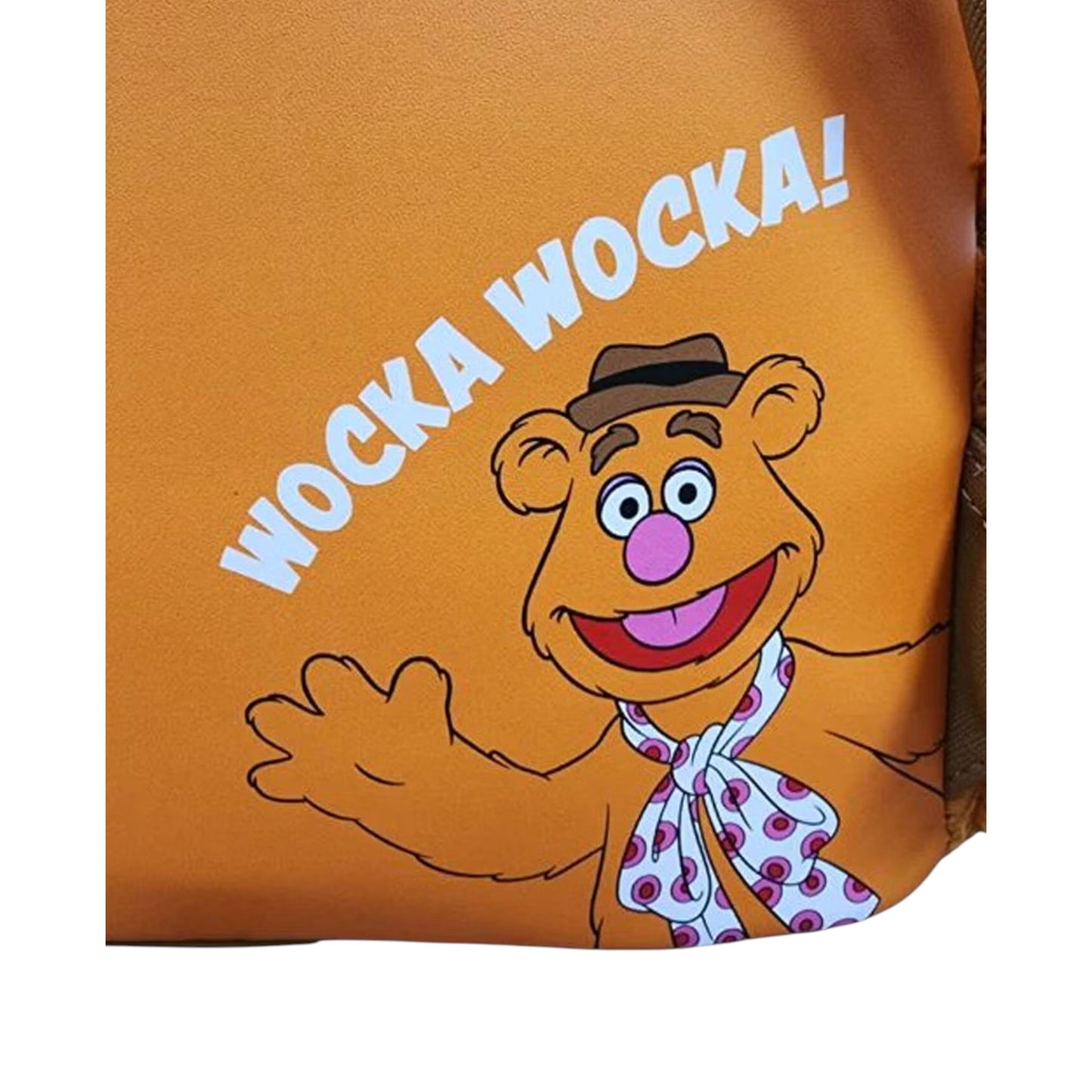 Muppets Fozzie Bear character with 'Wocka Wocka!' text on an orange background