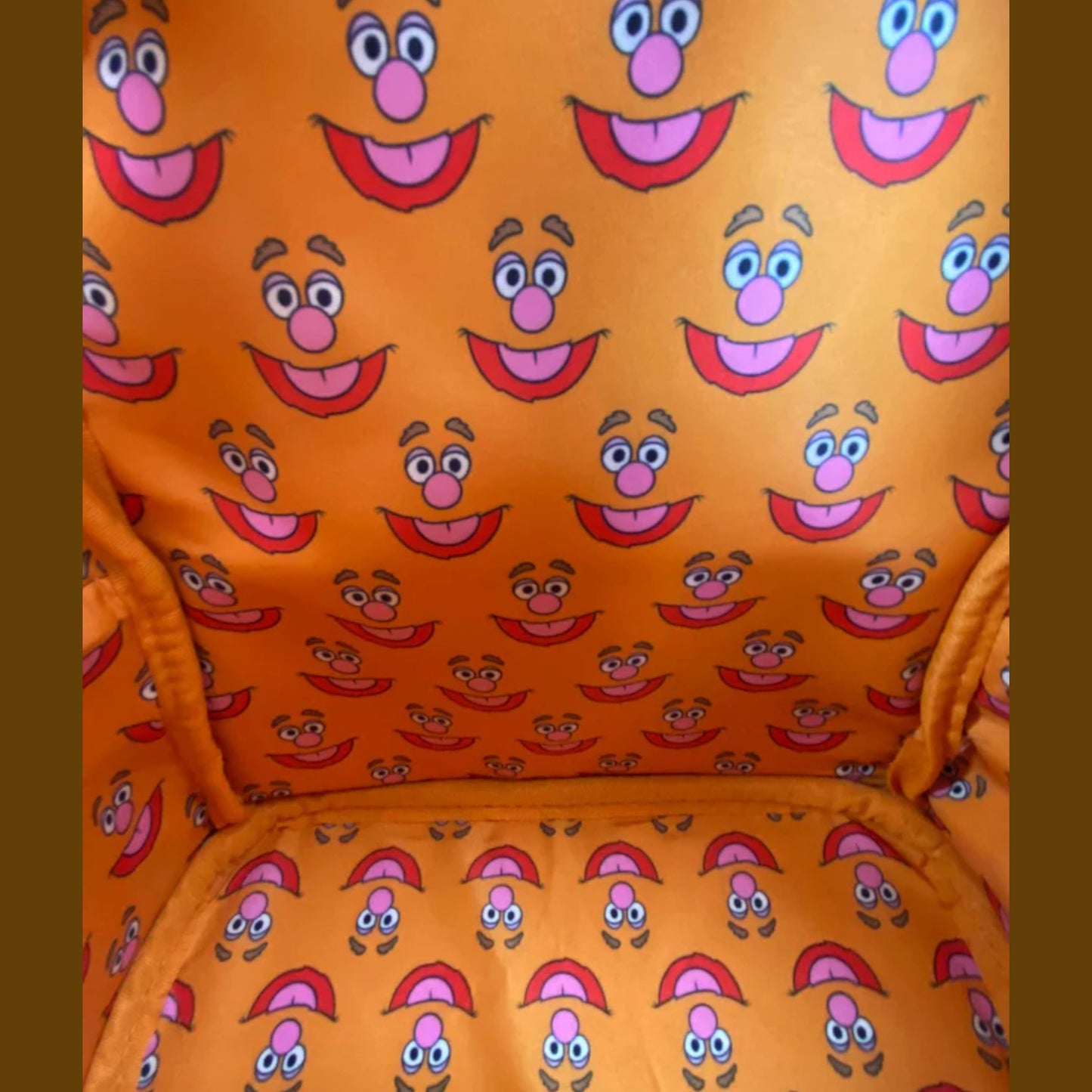 Orange pattern with Muppets Fozzie Bear face pattern