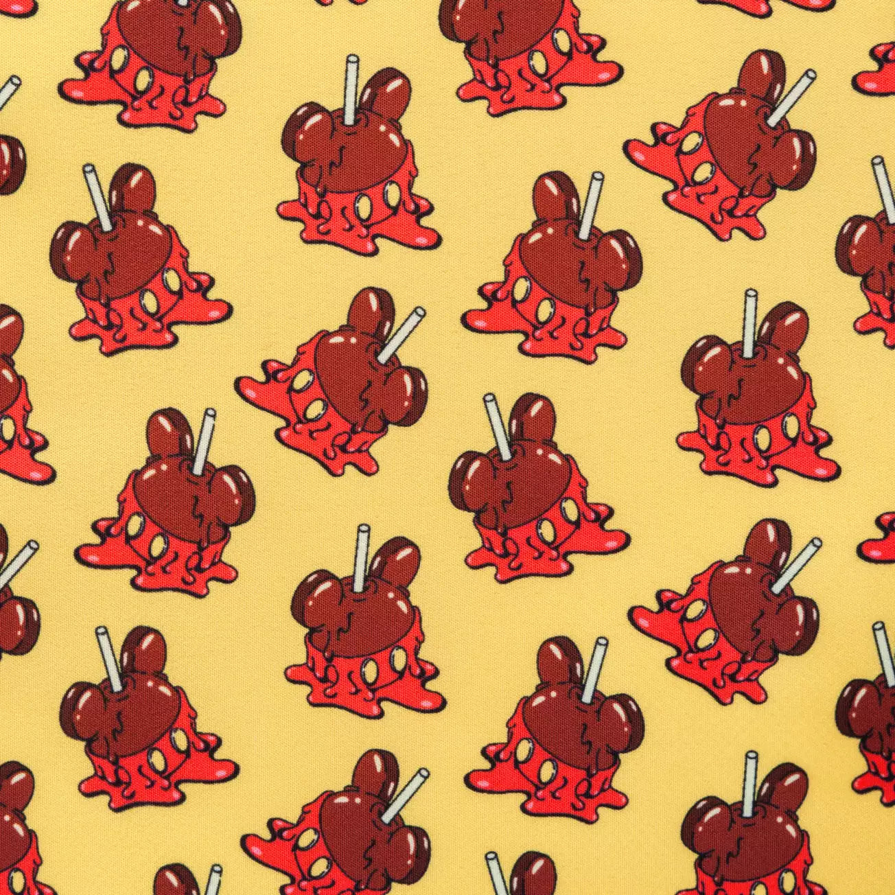 Pattern of red Candy Apple Mickey Mouse characters with ice cream cones on a yellow background