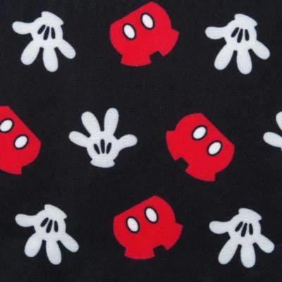 Pattern of red mickey mouse pants and white mickey mouse gloves on a black background