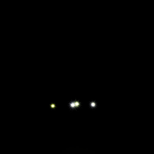 Cars Lightning McQueen & Sally Nighttime Light-Up backpack with Three small bright headlights lights on a black background