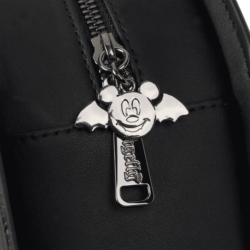 Metallic keychain with mickey bat design and Loungefly text attached to a black bag.