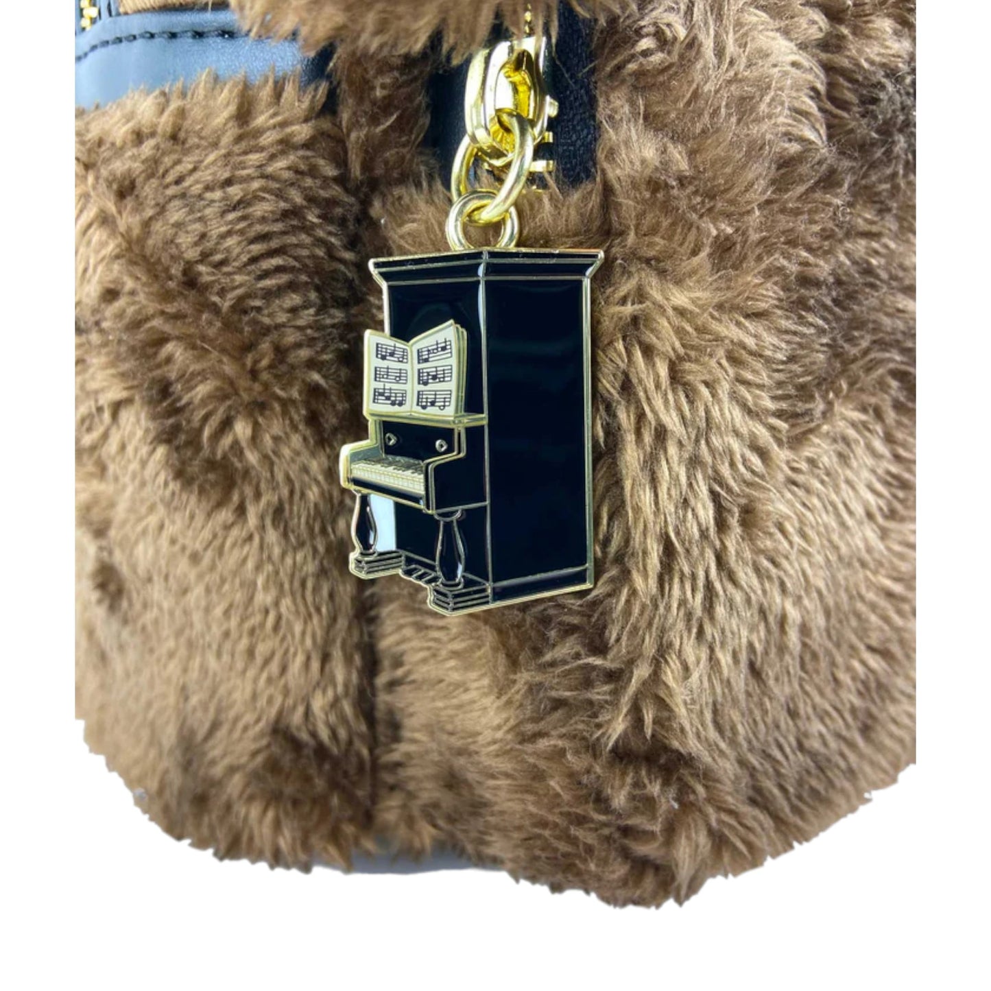 Muppets Rowlf Backpack with a piano-shaped zipper charm on a white background