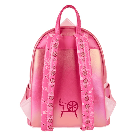 Pink backpack with decorative spindle elements on a white background