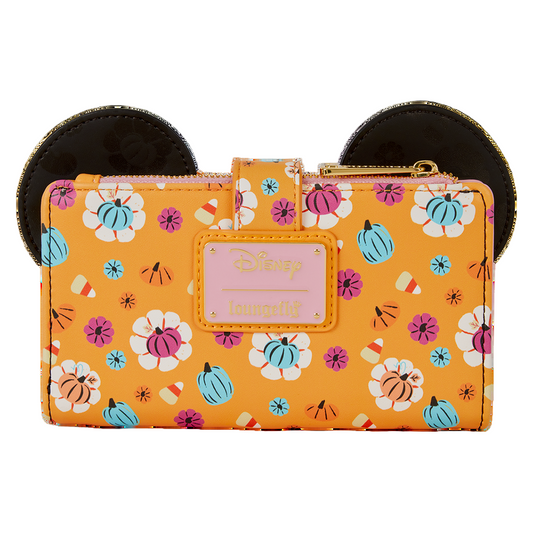 Floral and pumpkin patterned wallet with Disney logo on a white background