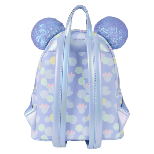 Backpack with polka dot pattern and blue ears on a white background