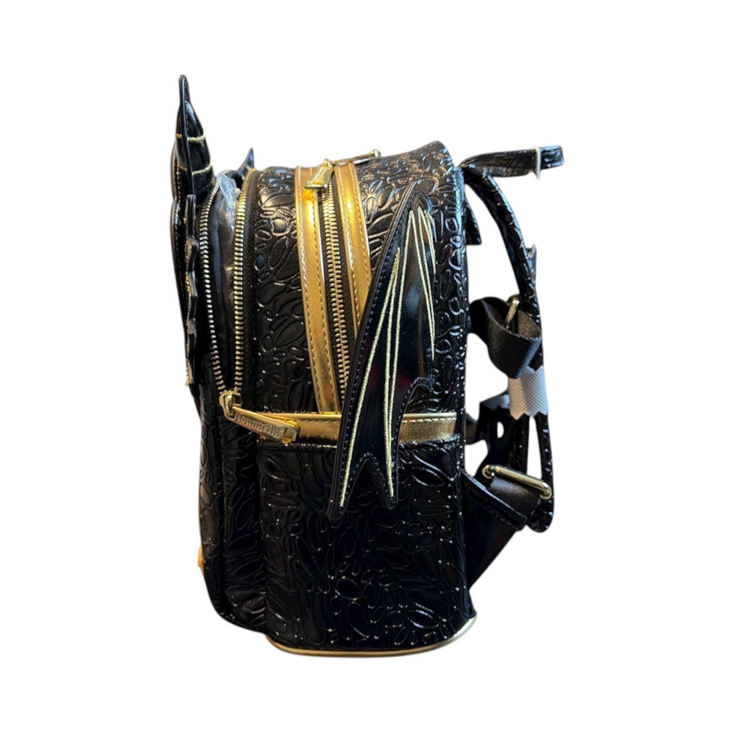 Black leather Fourth Wing Black Gold Dragon Mini Backpack with gold scale accents on a white background