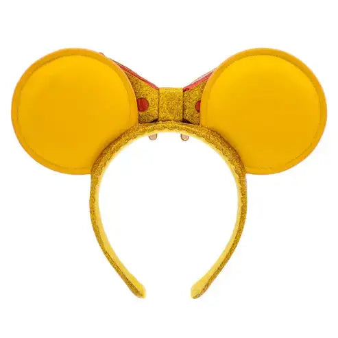 Yellow mouse ears headband with a bow on a white background