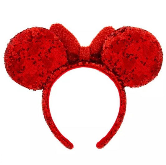 Red velvet mouse ears headband on a white background