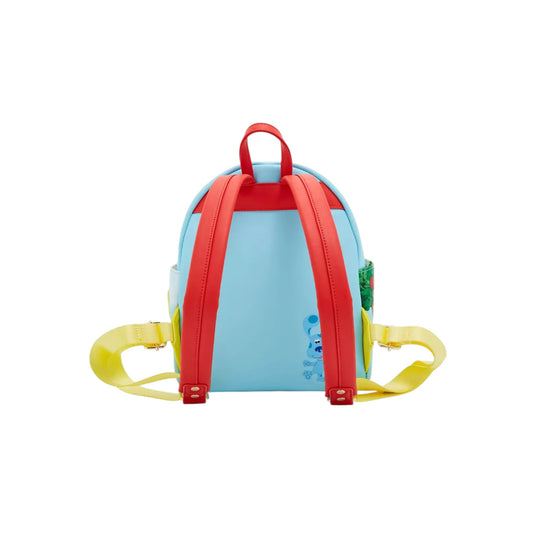 Back of blue backpack with red straps and a picture of Blue on a white background