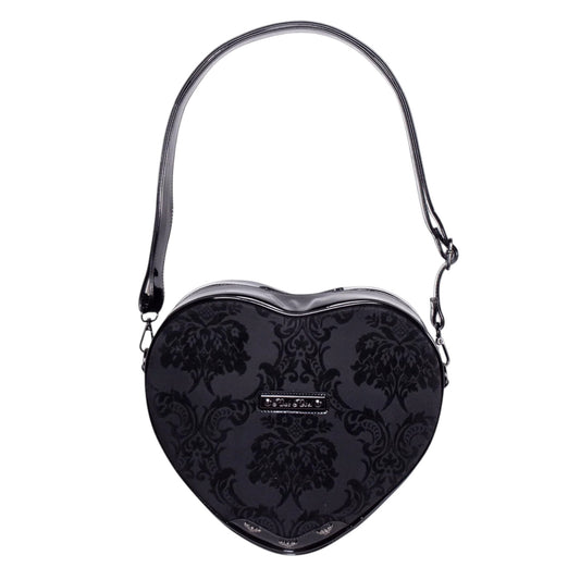 A black heart-shaped shoulder bag with a glossy damask pattern, featuring a silver-tone metal plaque on the front and a matching black strap, shown against a plain white background.