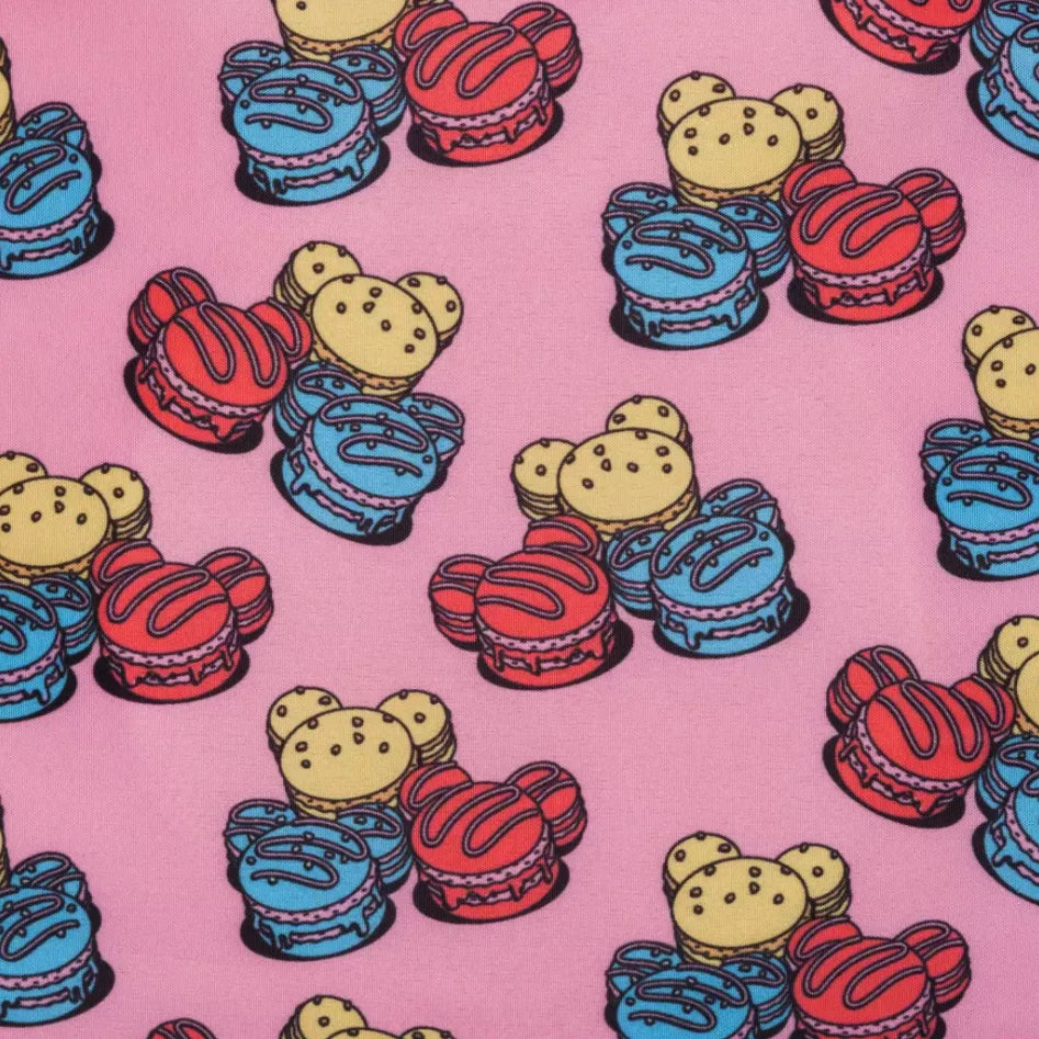 Colorful mickey mouse heads shaped like macarons pattern on a pink background