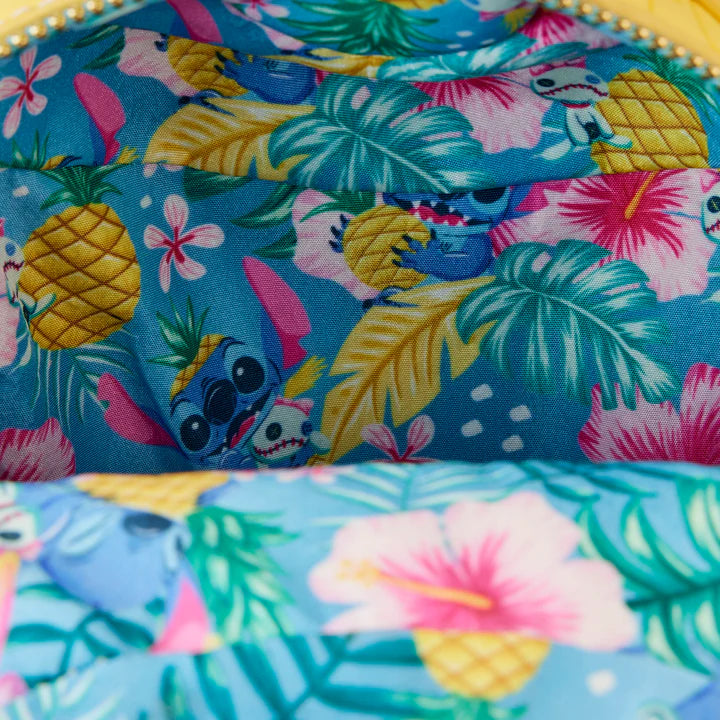 Close-up of inside of Pineapple-shaped Stitch Shoppe Disney Lilo and Stitch Figural Pineapple Crossbody Bag with colorful fabric with Stitch, pineapple, leaf, and flower pattern
