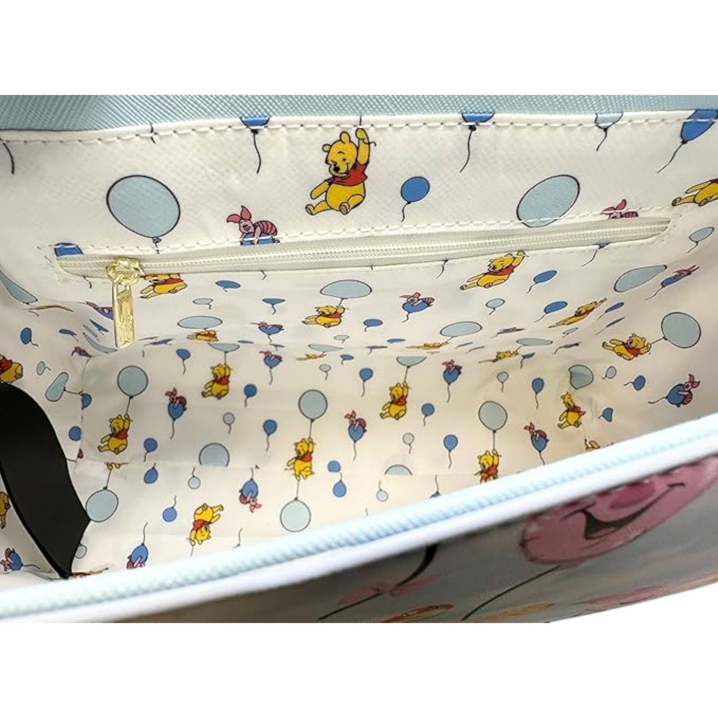 Winnie the Pooh Balloon Friends character-themed product with a zipper on a white background