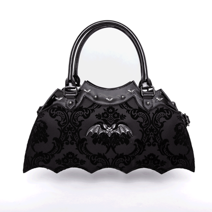 Black bat shaped bag on a white background