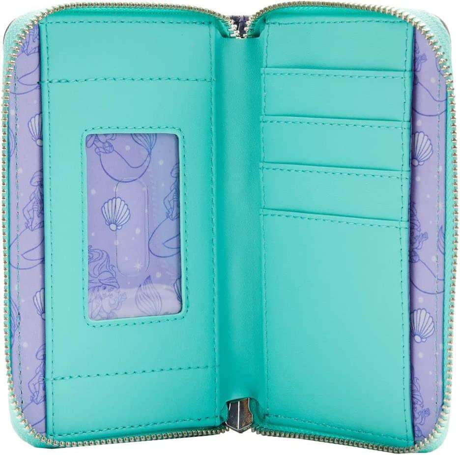 Open teal and purple wallet with shell pattern