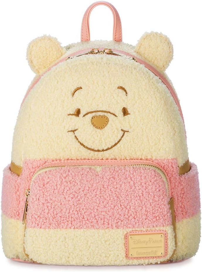 Winnie the Pooh Fuzzy Plush backpack with pink and beige colors on a white background