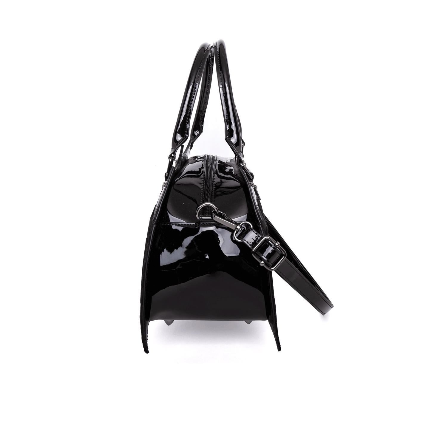 Side view of black bat shaped bag with crossbody strap attachd on a white background