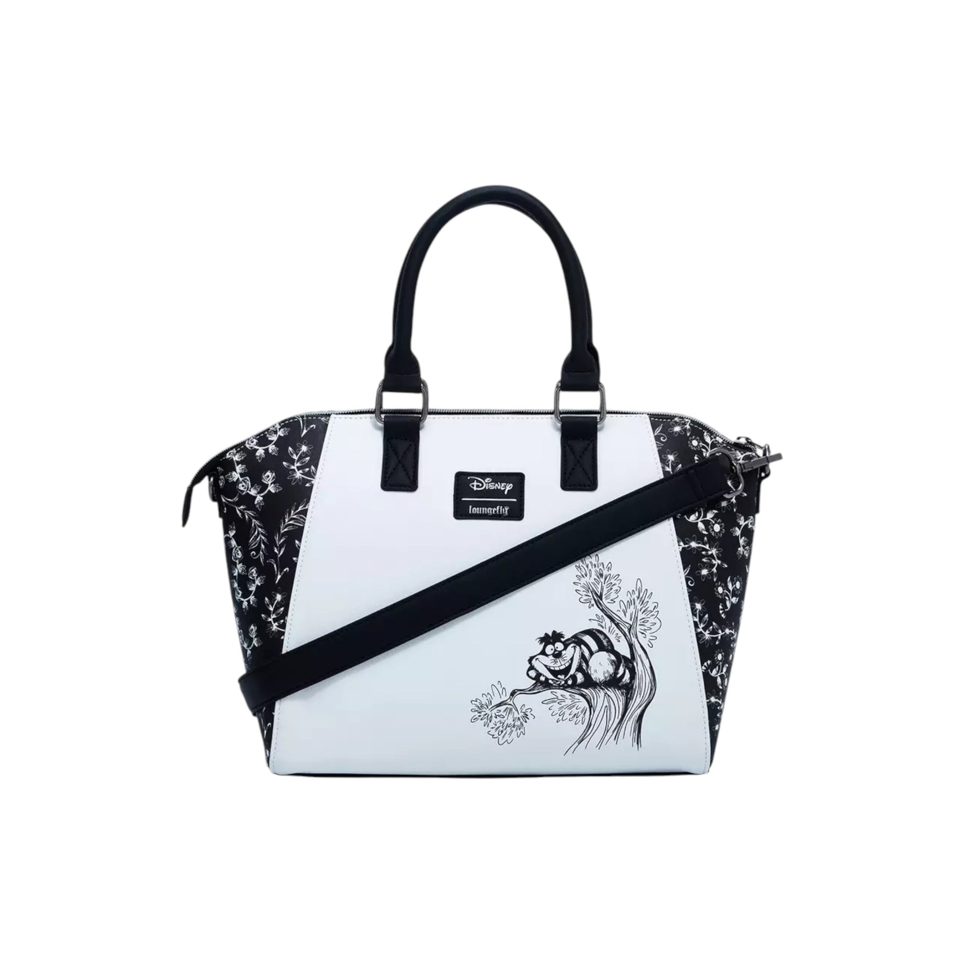  Alice In Wonderland Black & White Satchel Bag with black floral pattern and white front panel featuring gnCheshire Cat desi, on a white background.