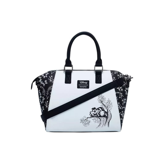  Alice In Wonderland Black & White Satchel Bag with black floral pattern and white front panel featuring gnCheshire Cat desi, on a white background.