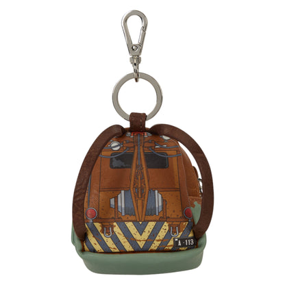 A small leather keychain bag shaped like the front of a train, featuring brown leather straps, a silver metal key ring and clasp, an orange-brown body with yellow and blue striped detailing, and a muted green base, shown on a plain white background.