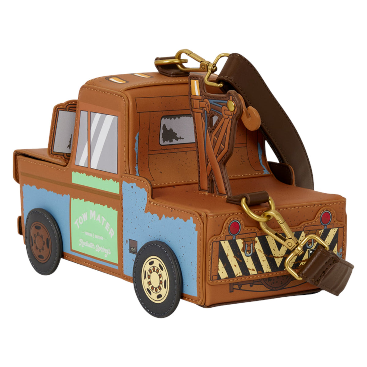 A Tom Mater themed clutch bag designed like a tow truck from Disney's Cars, featuring a brown faux-leather body, blue side panel, gold-tone hardware, and a brown shoulder strap, shown on a plain white background.