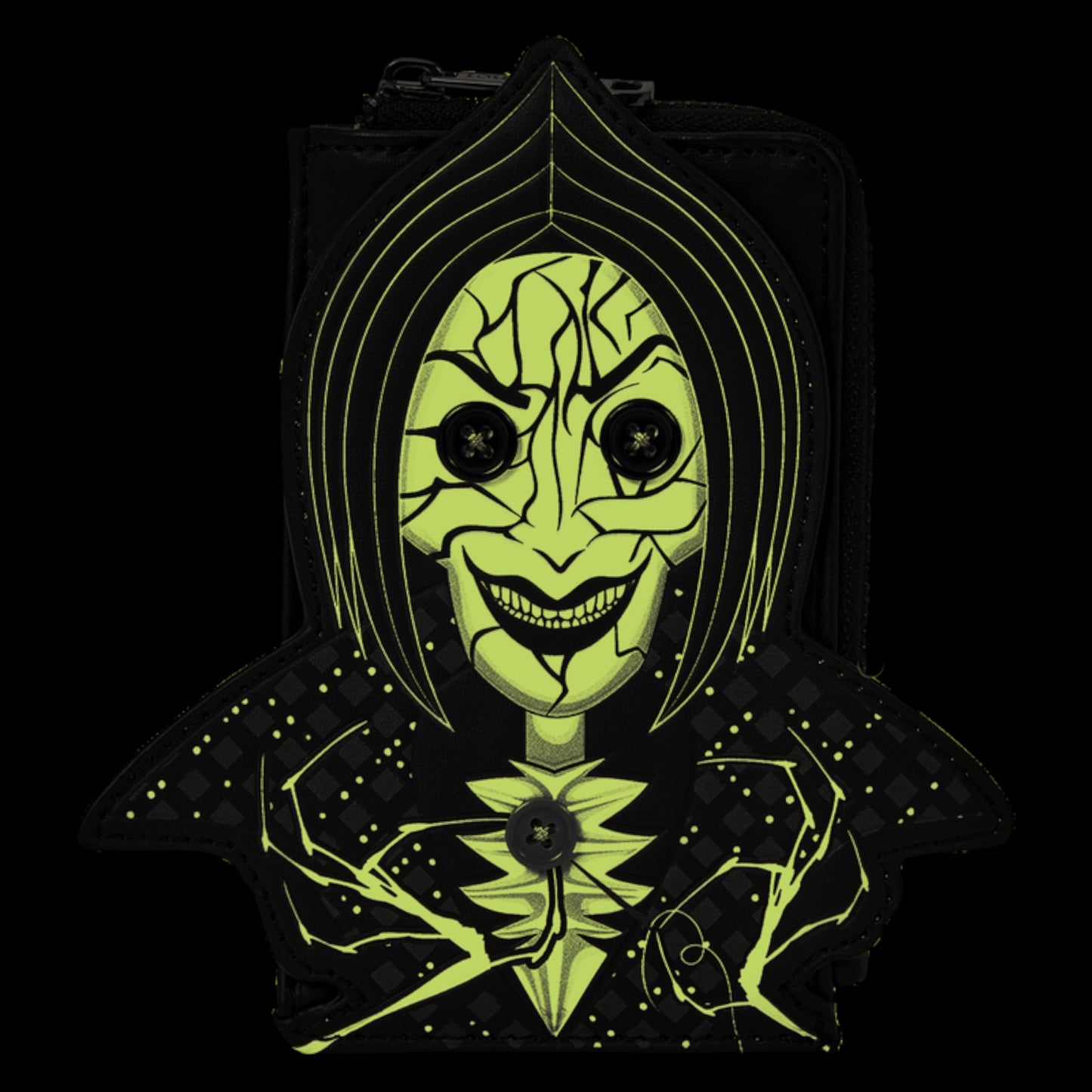 A black hooded bag or pouch featuring a stylized neon yellow-green face graphic with cracked facial features, large black eyes, and a wide grin, shown against a solid black background.