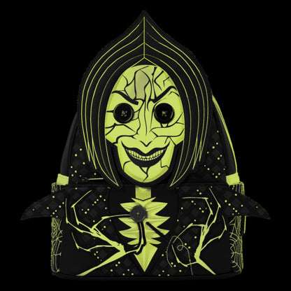 A black hooded backpack featuring a neon yellow-green graphic of a creepy, cracked mask with glowing eyes and a wide grin, accented with small yellow-green star-like dots and web patterns on a solid black background.