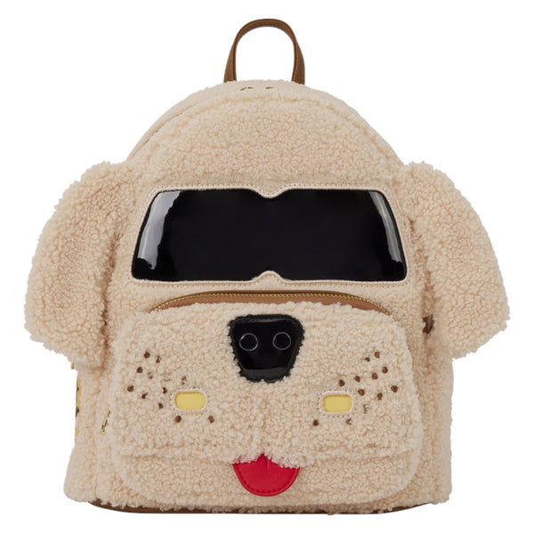 A dog-shaped teddy fleece backpack in beige, featuring a black face window, black nose, yellow nose patches, a red tongue, and brown ears and top handle.