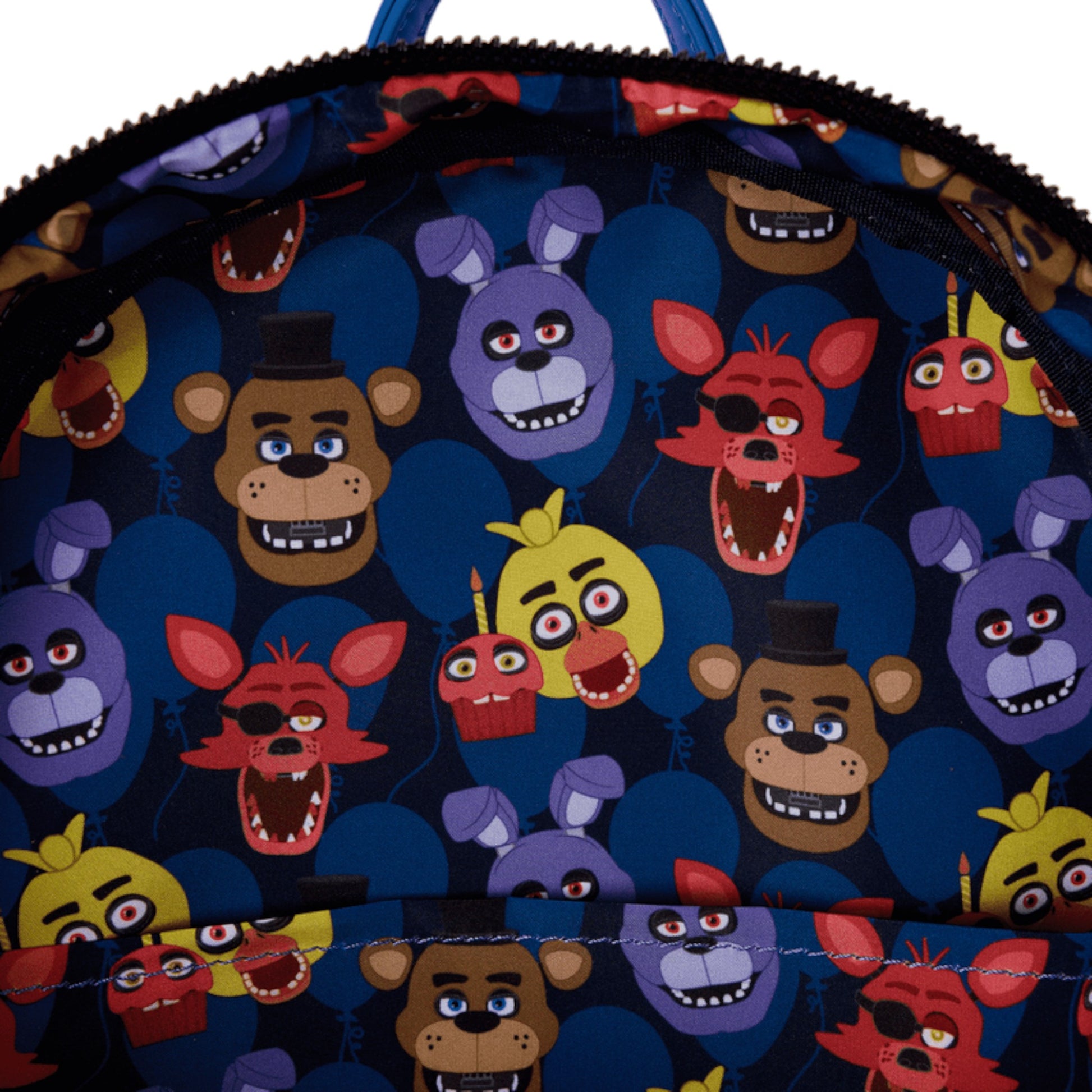 Backpack with colorful Five Nights at Freddy's movie character patterns on a blue background