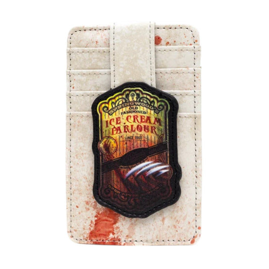 A cream-colored faux leather money clip wallet with a distressed, blood-splattered design and a central vintage-style patch reading 'Springwood's Old Fashioned Ice Cream Parlour"'.