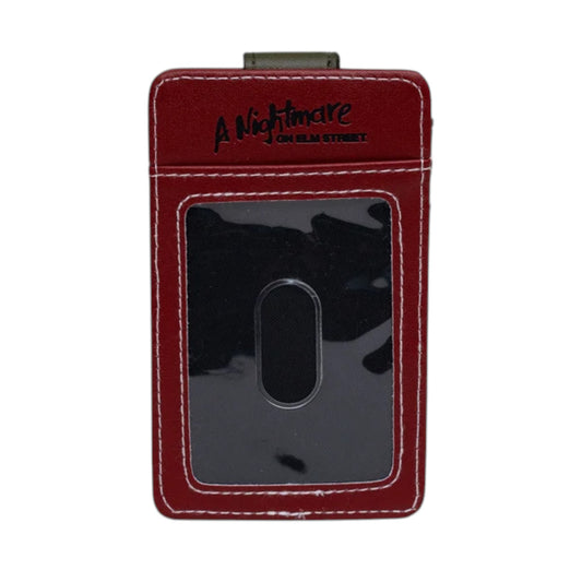 A red faux-leather card holder featuring white contrast stitching, a clear ID window with a black insert, and 'A Nightmare on Elm Street' printed in black on the top flap.