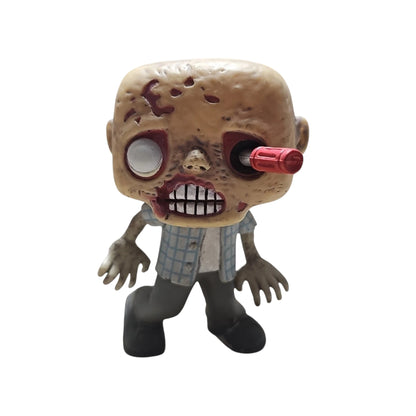 The Walking Dead RV Walker figurine with a red screwdriver in his eye on a white background