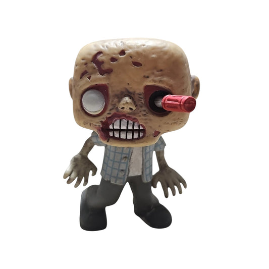 The Walking Dead RV Walker figurine with a red screwdriver in his eye on a white background