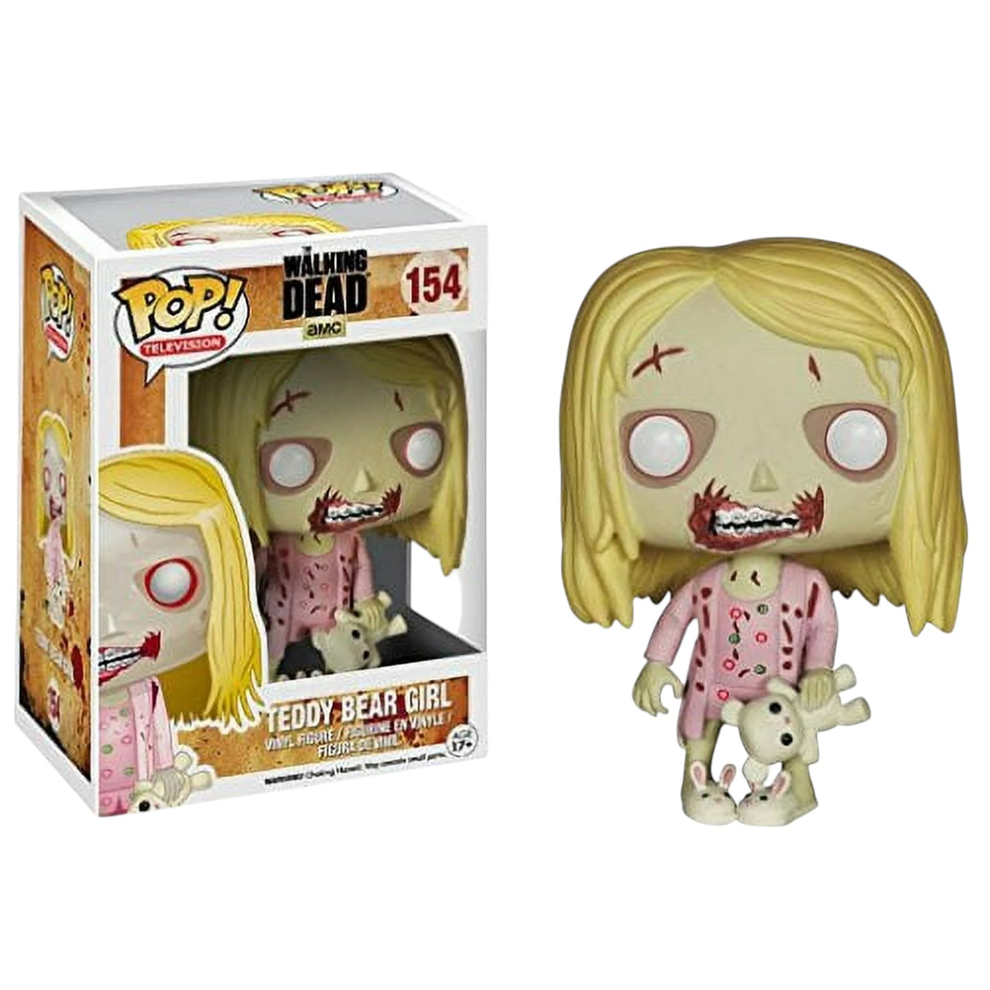 Funko Pop! vinyl figure of The Walking Dead Teddy Bear Girl with blonde hair and pink pajamas, next to its packaging.