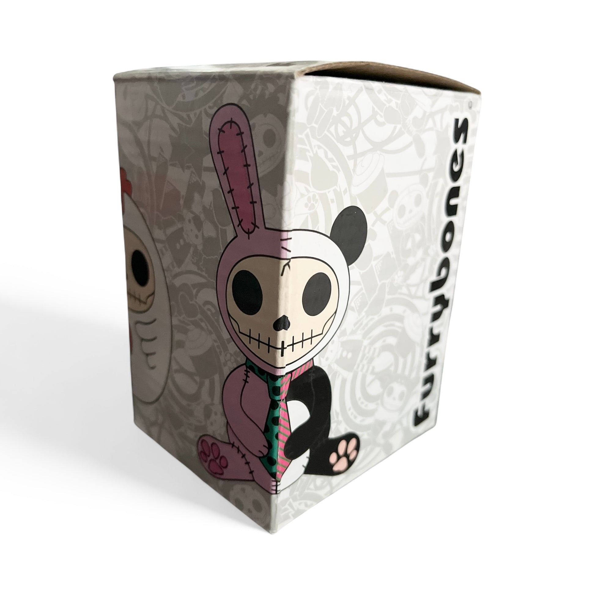Figurine character on a box with 'Furrybones' branding on a white background