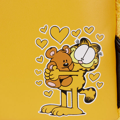Garfield and Pooky hugging with hearts on a yellow background