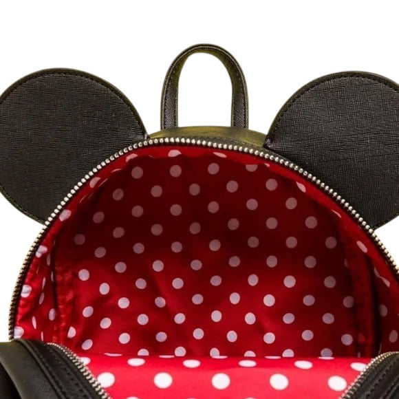 Backpack with Mickey Mouse ears featuring a red interior with white polka dots.