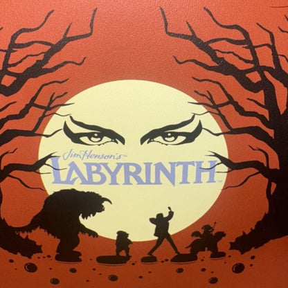 Loungefly Labyrinth Ludo Cosplay Mini Backpack with "Jim Henson's , trees, moon and eyes Labyrinth" text, labyrinth characters on a white background