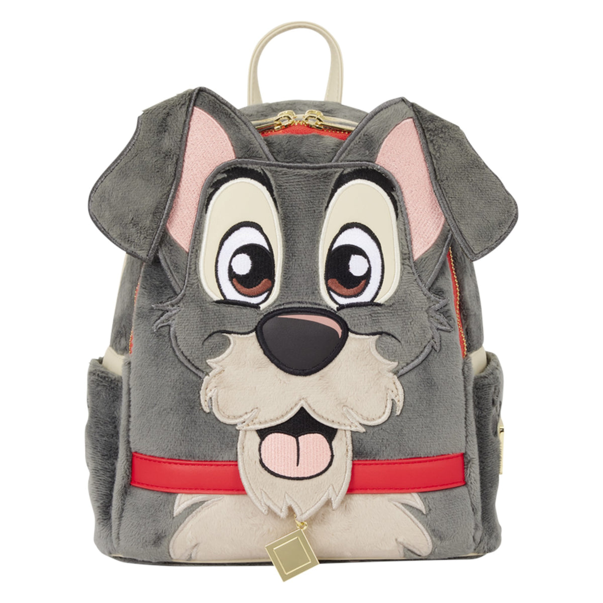 Plushy Tramp Mini Backpack featuring a gray dog design with pink inner ears, cream-colored snout and chin, large embroidered eyes, a red collar, and a small hanging gold tag, shown on a plain white background.