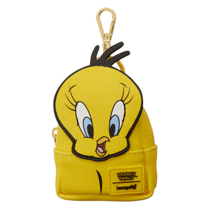 A yellow Looney Tunes character keychain pouch featuring Tweety Bird's face, with a gold-tone clasp at the top and a Looney Tunes patch on the front, shown on a plain white background.