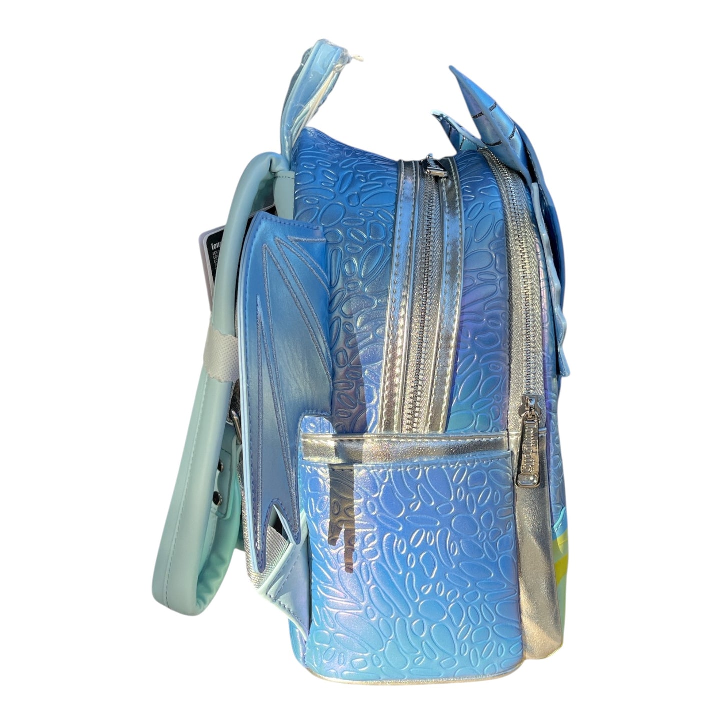 Blue and silver Blue Dragon Mini Backpack with scale pattern on a white background