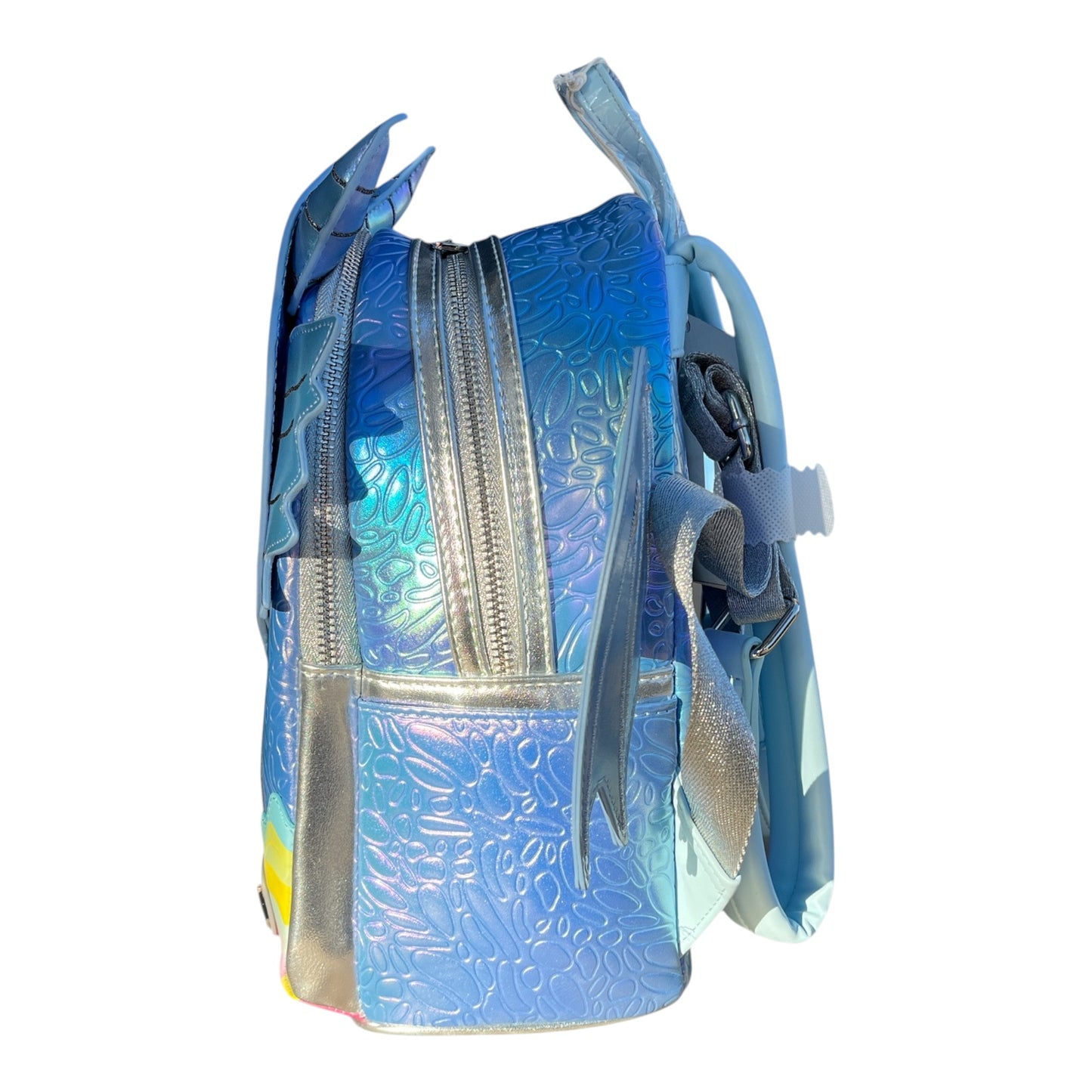 Blue and silver Blue Dragon Mini Backpack with scale pattern on a white background