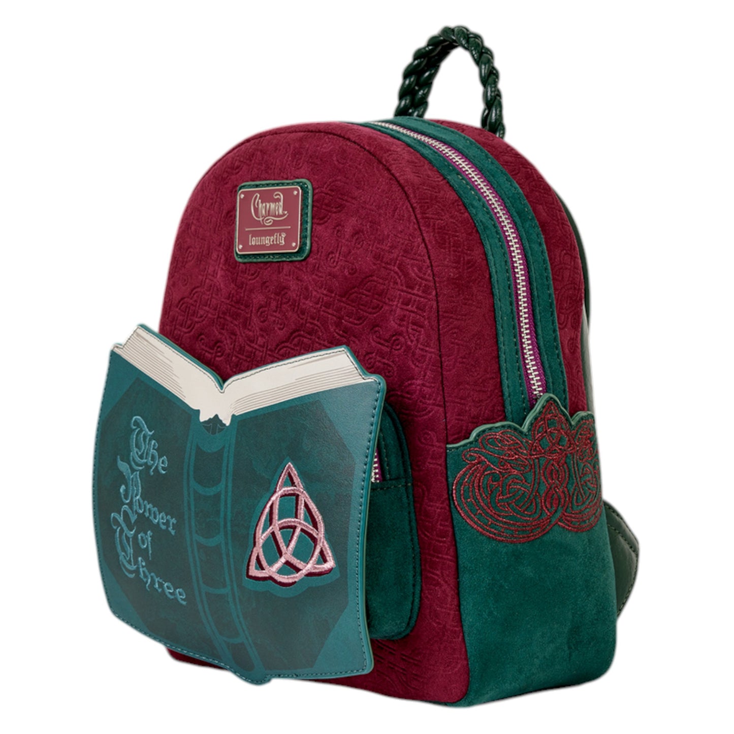Red and green Loungefly Paramount Charmed Light-Up Mini Backpack with book design and 'The Power of Three' text on a white background